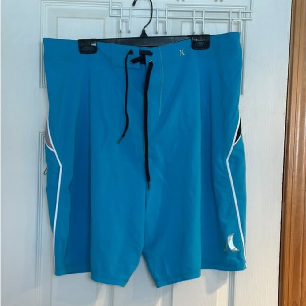 Men’s bright blue and black Hurley Phantom board shorts (with pockets).